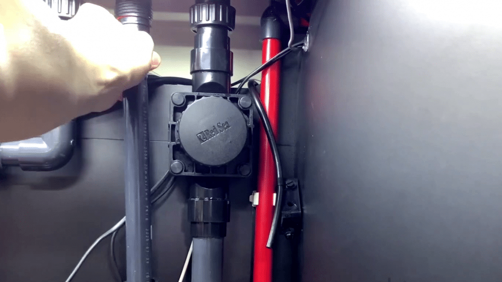 Remove the sump overflow pipe.